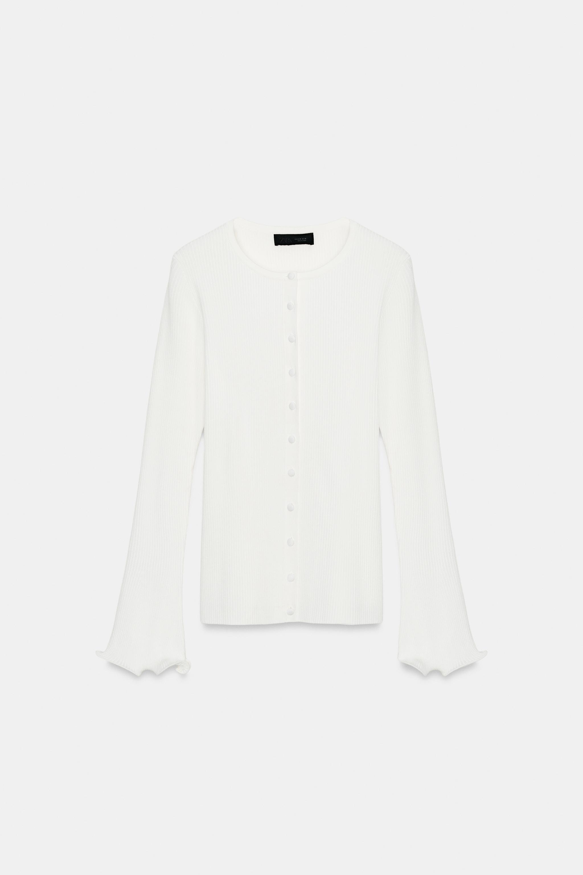 GILET EN MAILLE CÔTELÉE À FINITIONS ONDULÉES
